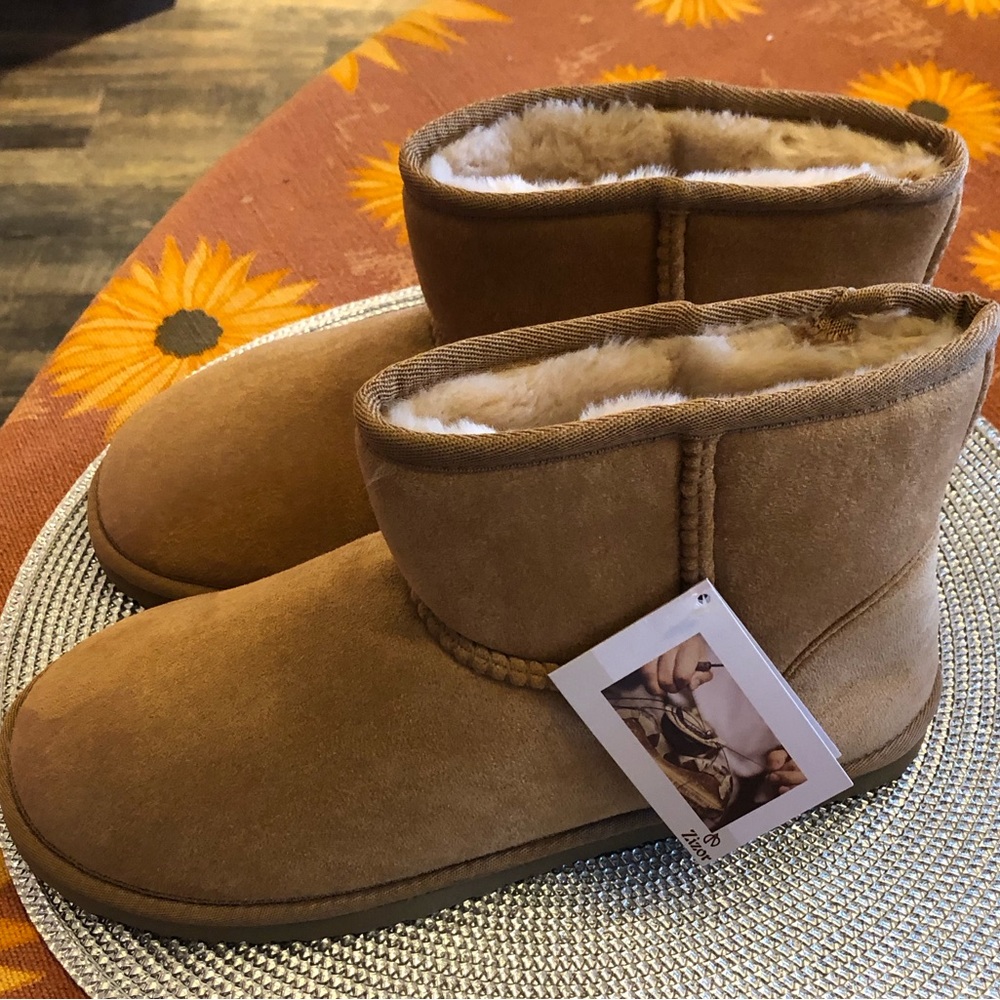 Ugg-like cozy tan fuzzy short booties, women’s size 10. New, never worn.